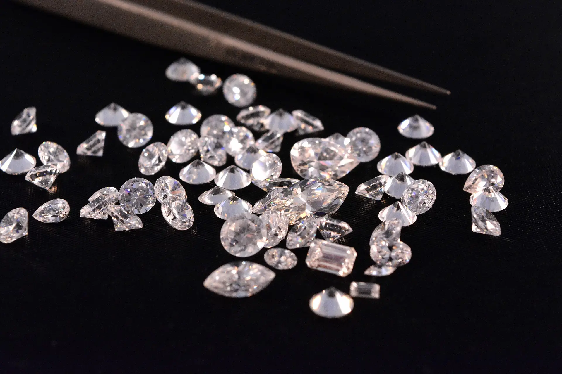 A Peony Jewelry diamond display that highlights the luxury and artistry behind vintage handmade jewelry materials.