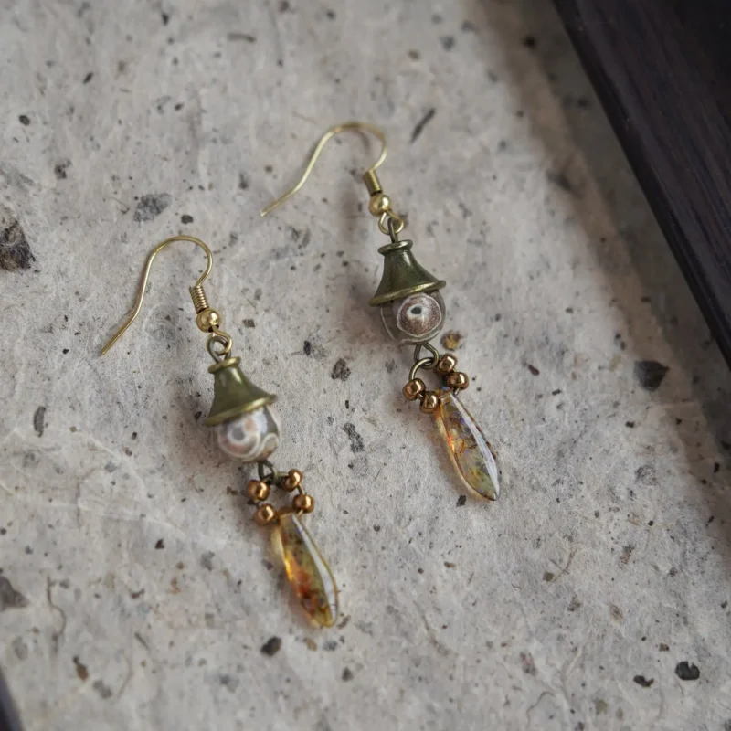 Amber-tone handmade earrings make a heartfelt and stylish gift for a close friend.