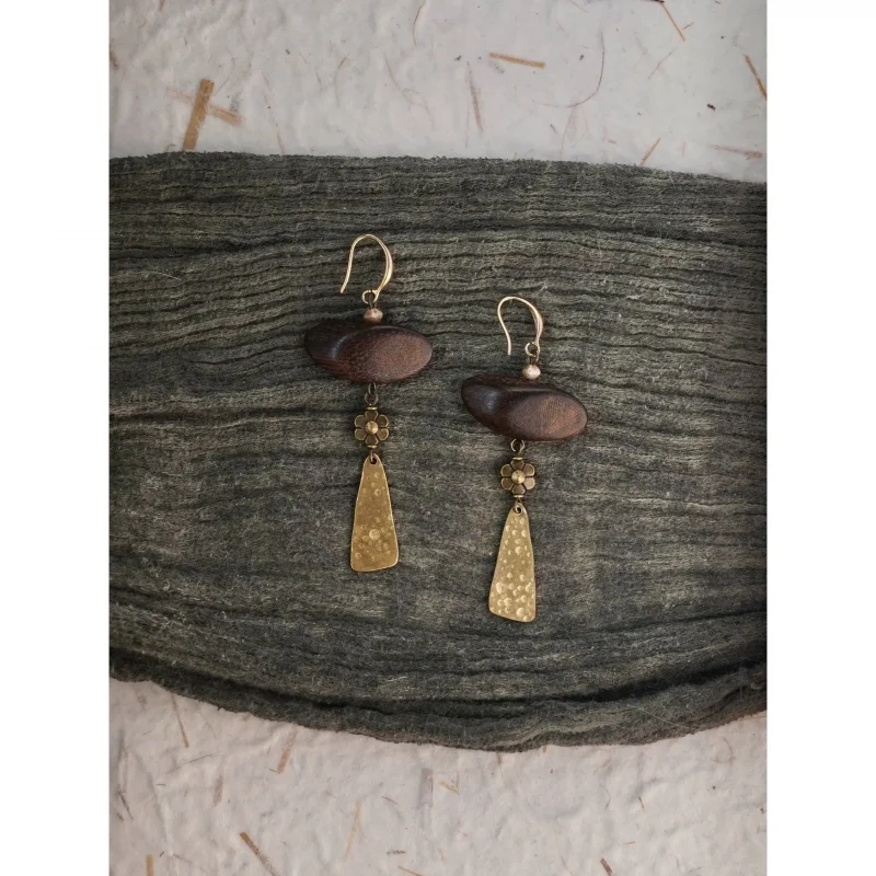 Brass earrings add vintage charm, making them a heartfelt gift for your mom.