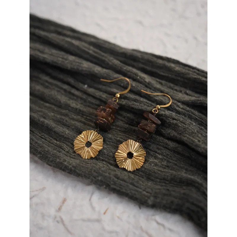 These handmade pendant earrings embody a vintage Zen style that blends artistry with quiet elegance.