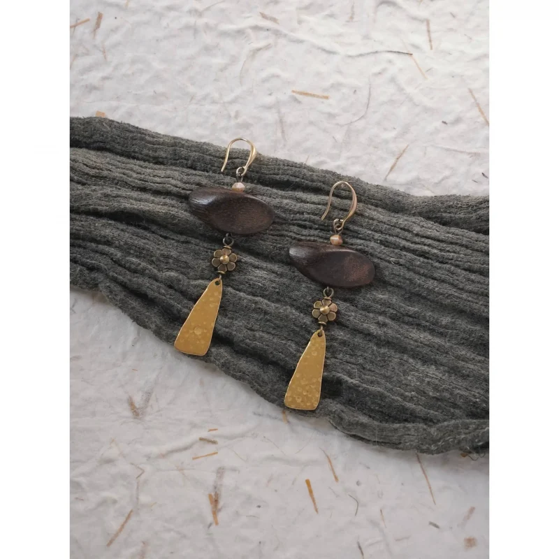 These handmade vintage earrings feature a unique design that stands out from the crowd.