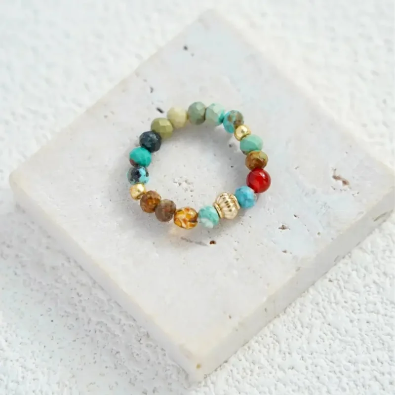 Handcrafted natural stone ring channels vintage elegance with Dunhuang-inspired details.
