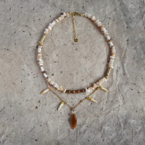 Personalized original necklace handcrafted with artistic flair, perfect for expressing women’s unique beach style.