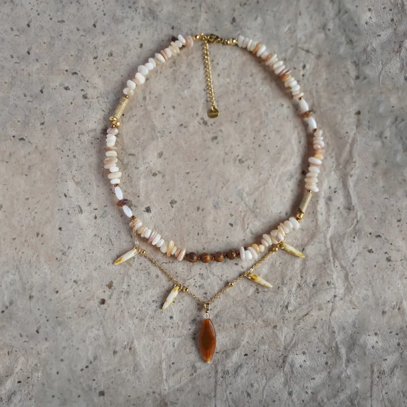 Personalized original necklace handcrafted with artistic flair, perfect for expressing women’s unique beach style.