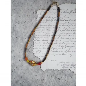 This handmade necklace blends tiger’s eye with agate for a vintage-inspired, earthy elegance.