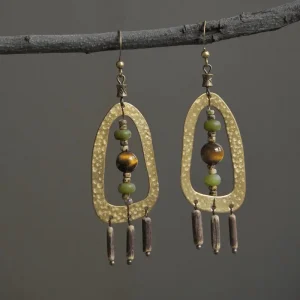 Handmade vintage brass earrings feature an original design, combining handmade charm with timeless elegance.