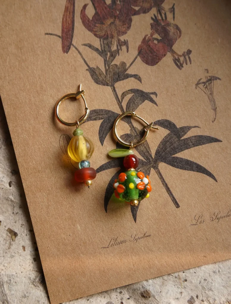 Handmade Bohemian earrings featuring colorful glass beads with vibrant details for a unique, artistic style.