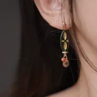 Model wearing French  Vintage handmade earrings