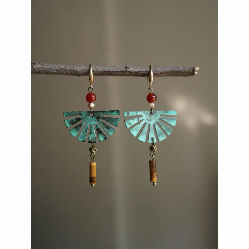 fan-shaped brass earrings handcrafted for an antique, feminine charm.