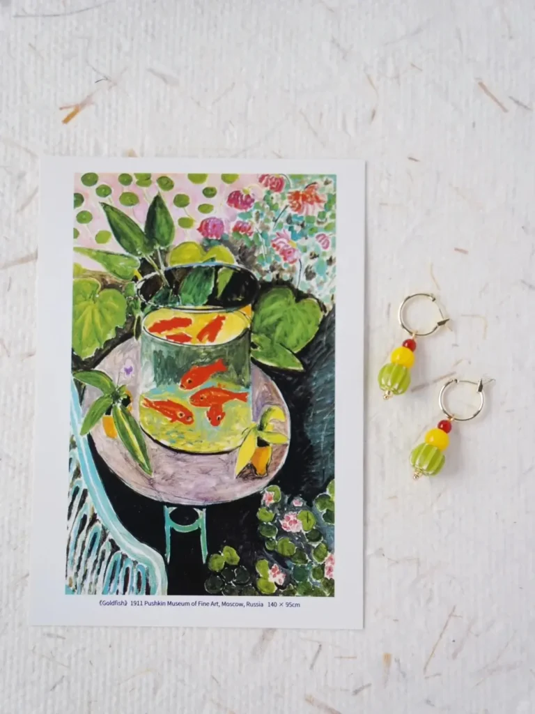 Handmade colorful earrings with Nepali glass beads and red-yellow agate inspired by Matisse’s Goldfish painting