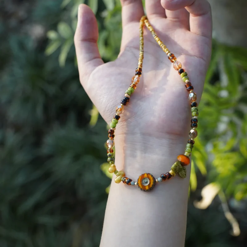 Handmade Czech glass necklace reflects natural beauty through artisan craftsmanship and feminine elegance