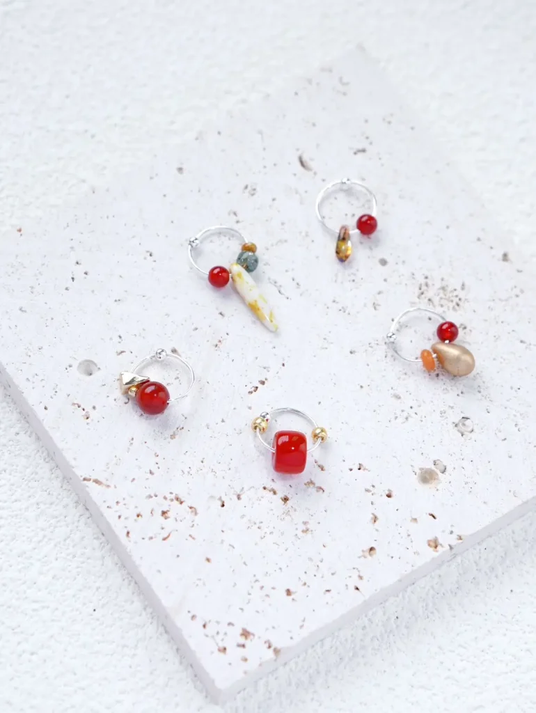 Handmade sterling silver hoop earrings with natural gemstones, an exquisite and simple accessory for women.
