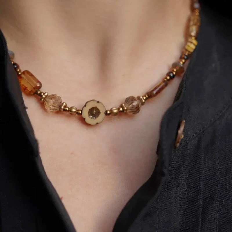 Model wearing vintage Czech glass bead necklace, showcasing handcrafted elegance and unique charm