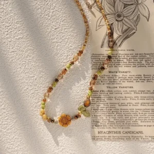 Handmade beaded necklace features vintage Czech glass for effortless everyday styling