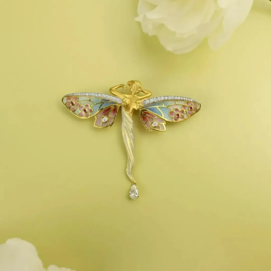 Enamel artwork of a fairy, capturing the delicate and ethereal charm of Art Nouveau craftsmanship.
Let me know if you'd like to tweak anything!