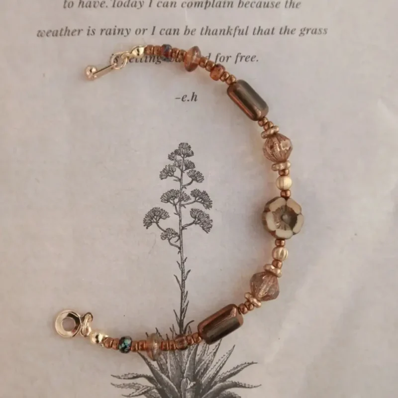 Handcrafted Czech bead bracelet features a vintage design and hidden clasp for effortless daily wear.