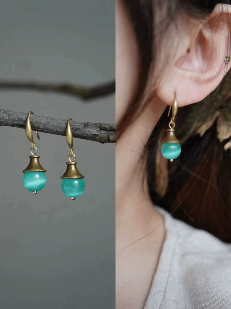PeonyJewels handmade blue Cat’s Eye earrings, reflecting vintage summer elegance with ocean-like depth.