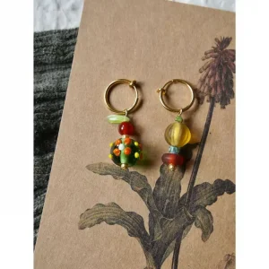 Beaded earrings made with colorful Nepalese glass beads, showcasing vintage handmade charm