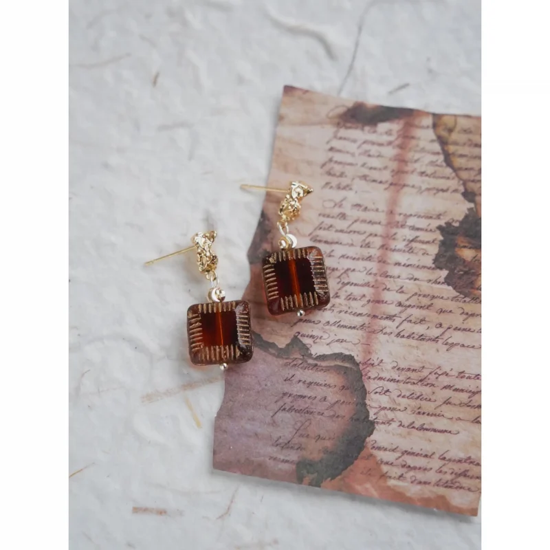 Vintage handmade earrings feature antique glass beads, perfect for women’s everyday elegance.