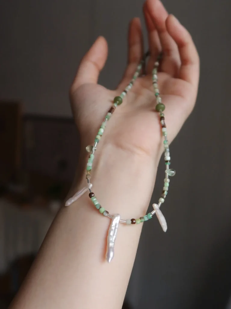 Vintage pearl necklace doubles as a wrap bracelet, offering versatile styling for women’s everyday looks