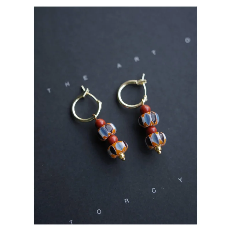14K gold-plated copper hoop earrings for women provide delicate style and skin-friendly comfort, handcrafted for versatile everyday wear.