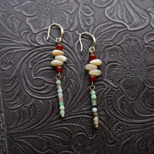 Handmade long dangle earrings featuring Australian jade with subtle Chinese-inspired design for modern minimalist style.
