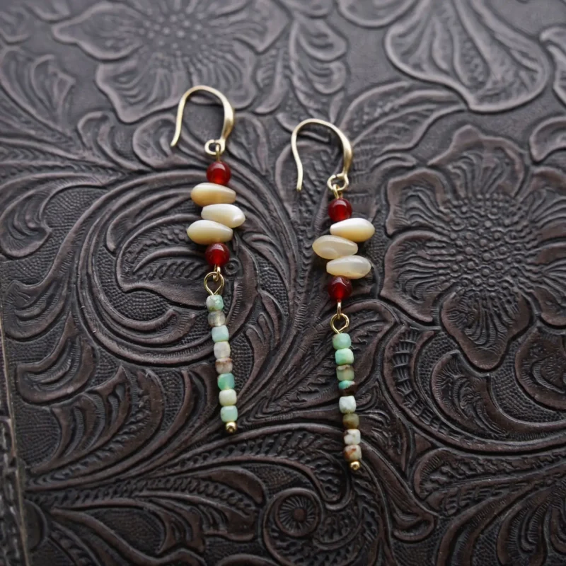 Handmade long dangle earrings featuring Australian jade with subtle Chinese-inspired design for modern minimalist style.
