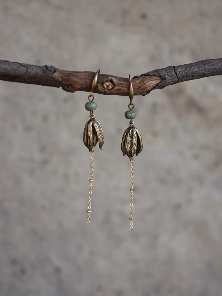 Minimalist handmade earrings inspired by botanical elements, adding natural elegance to women’s daily style with unique artistry.