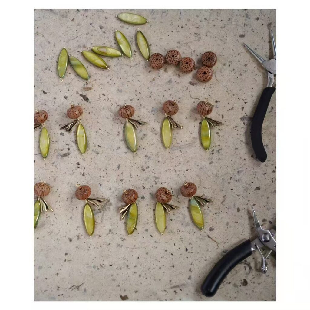 Handmade vintage earrings work in progress on PeonyJewels workbench