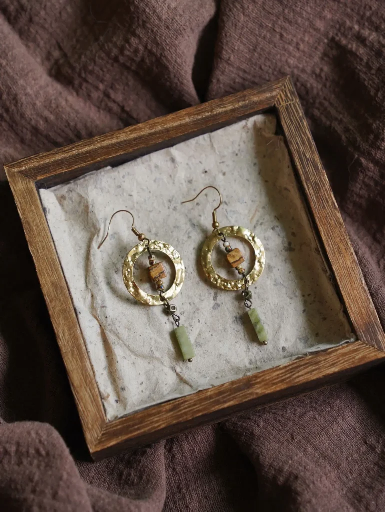 Round copper earrings with Southern Jade pendants, showcasing natural beauty for everyday wear.