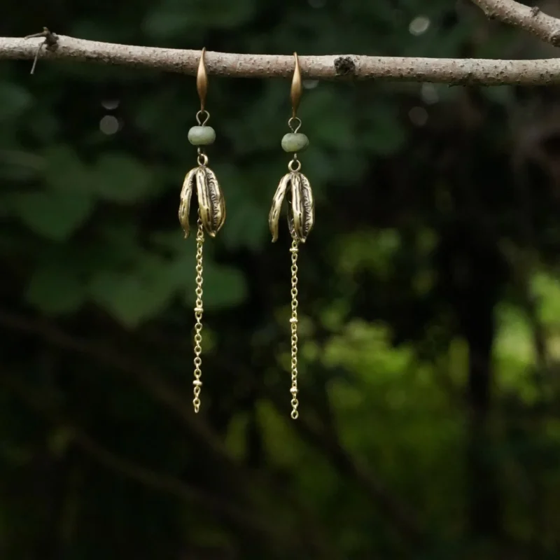 Statement earrings with original design and handcrafted details, offering women a unique and artistic jewelry choice.