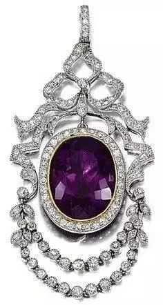 A close-up of a stunning amethyst and diamond pendant necklace.