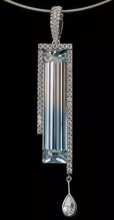 A beautiful bi-color topaz pendant, showcasing a smooth color transition from one hue to another.