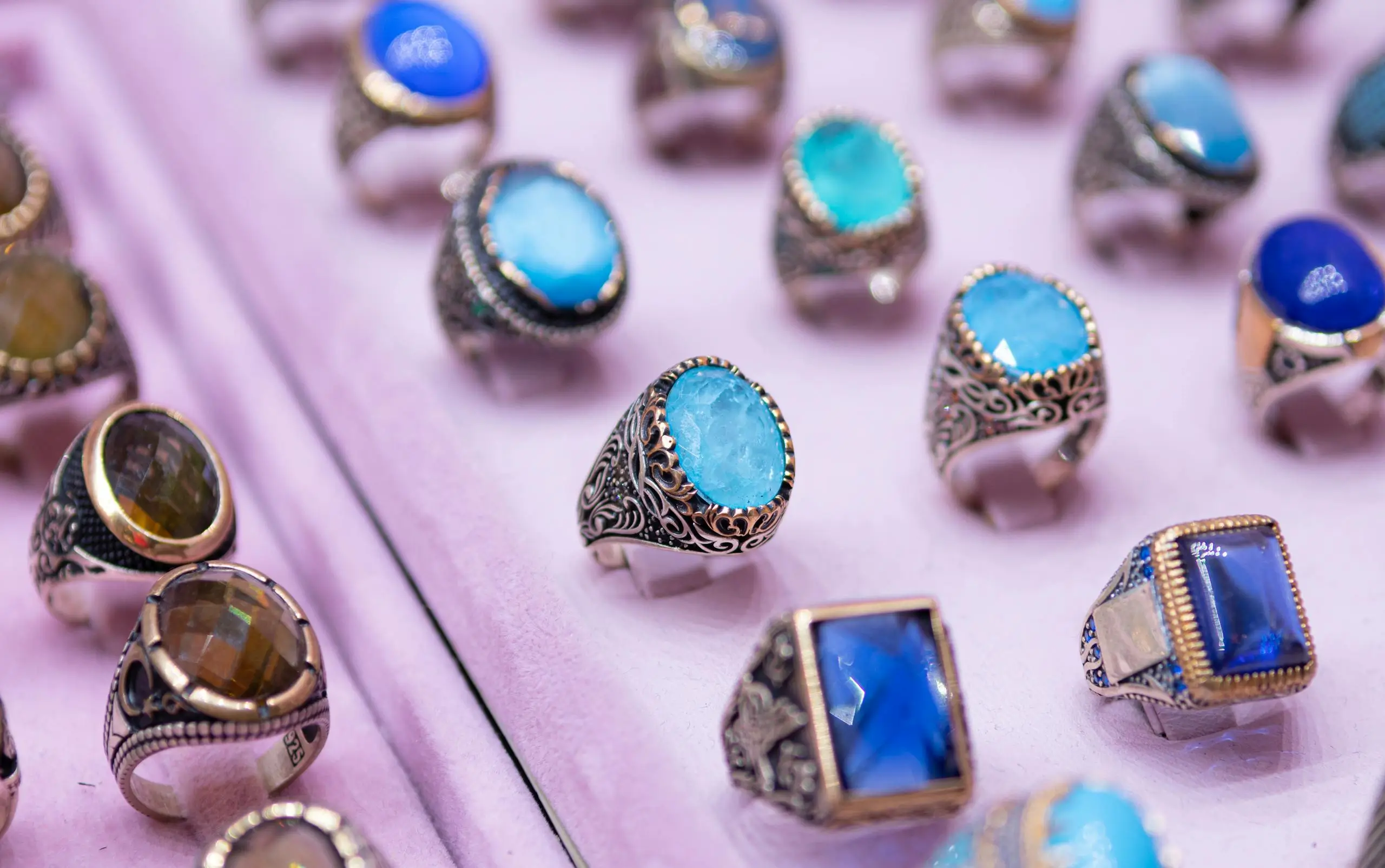 Blue Topaz gemstone ring sparkling under light, illustrating safe and irradiated gemstones for the article “Are Irradiated Gemstones Safe? Everything You Need to Know About Radiation in Jewelry”