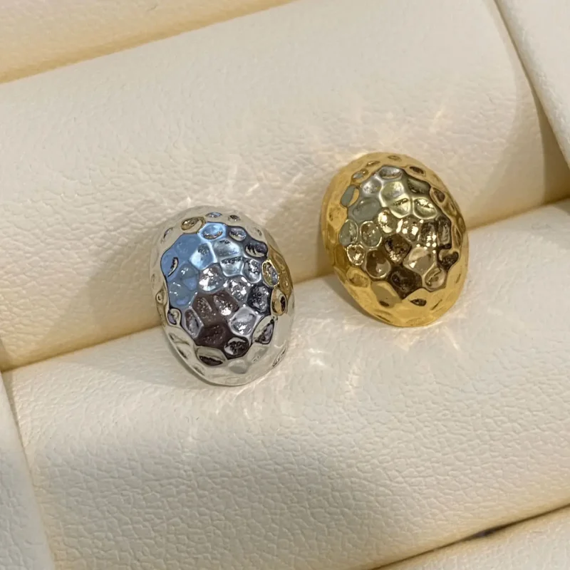 Minimalist stud earrings in gold and silver tones with color retention, designed for women’s effortless daily wear.