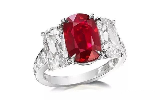 Unheated pigeon’s blood ruby featured at a Hong Kong jewelry auction, highlighting vivid red color and exceptional quality