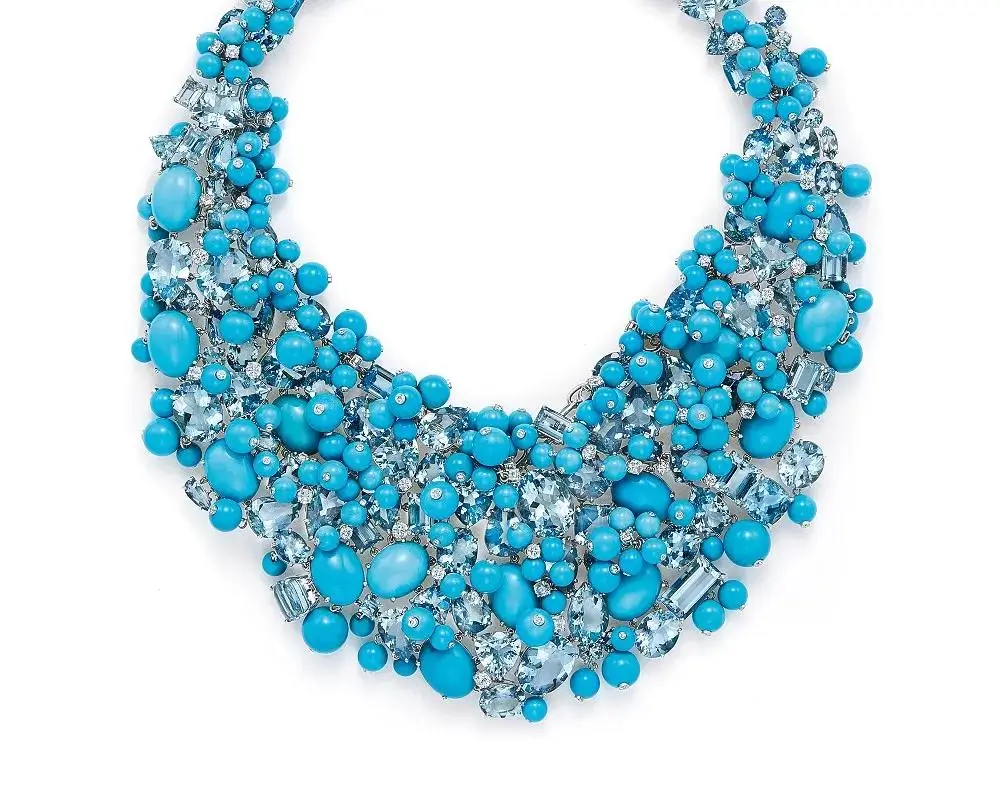 A stunning example of "Meirensong" turquoise, characterized by its exquisite sky-blue color and superior quality, often considered the finest grade of turquoise.