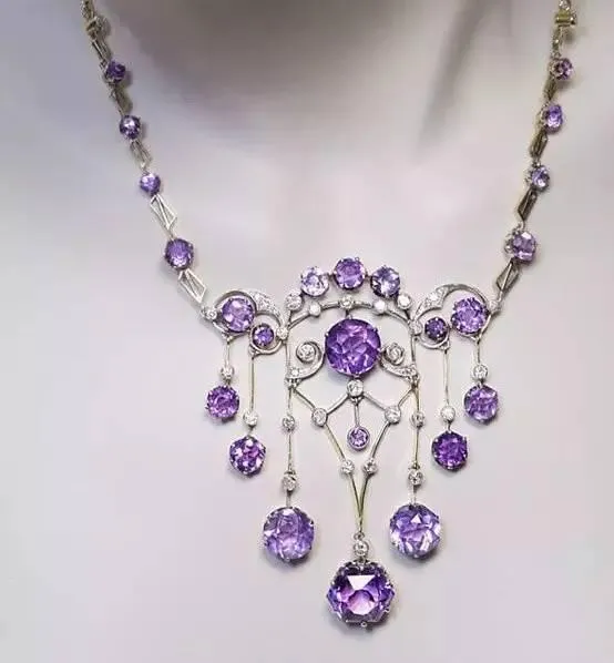 An antique Russian necklace featuring purple amethyst and diamonds.