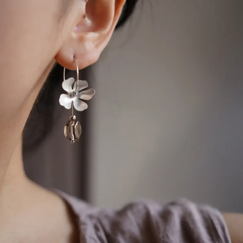 Sterling silver earrings with a vintage design, perfect for elegant daily wear.
