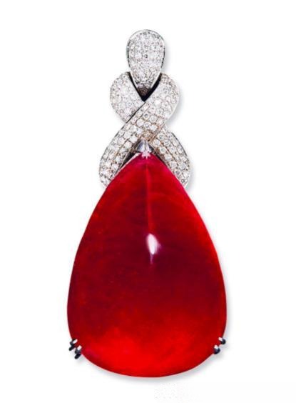 220-carat Rubellite tourmaline pendant showcasing vivid red color and rarity, one of the few red tourmalines to earn the Rubellite title