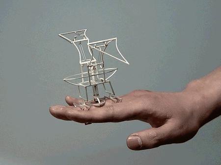 Kinetic jumping ring designed by Dukno Yoon from Seoul, Korea, featuring mechanical movement that mimics a bird's wings in motion