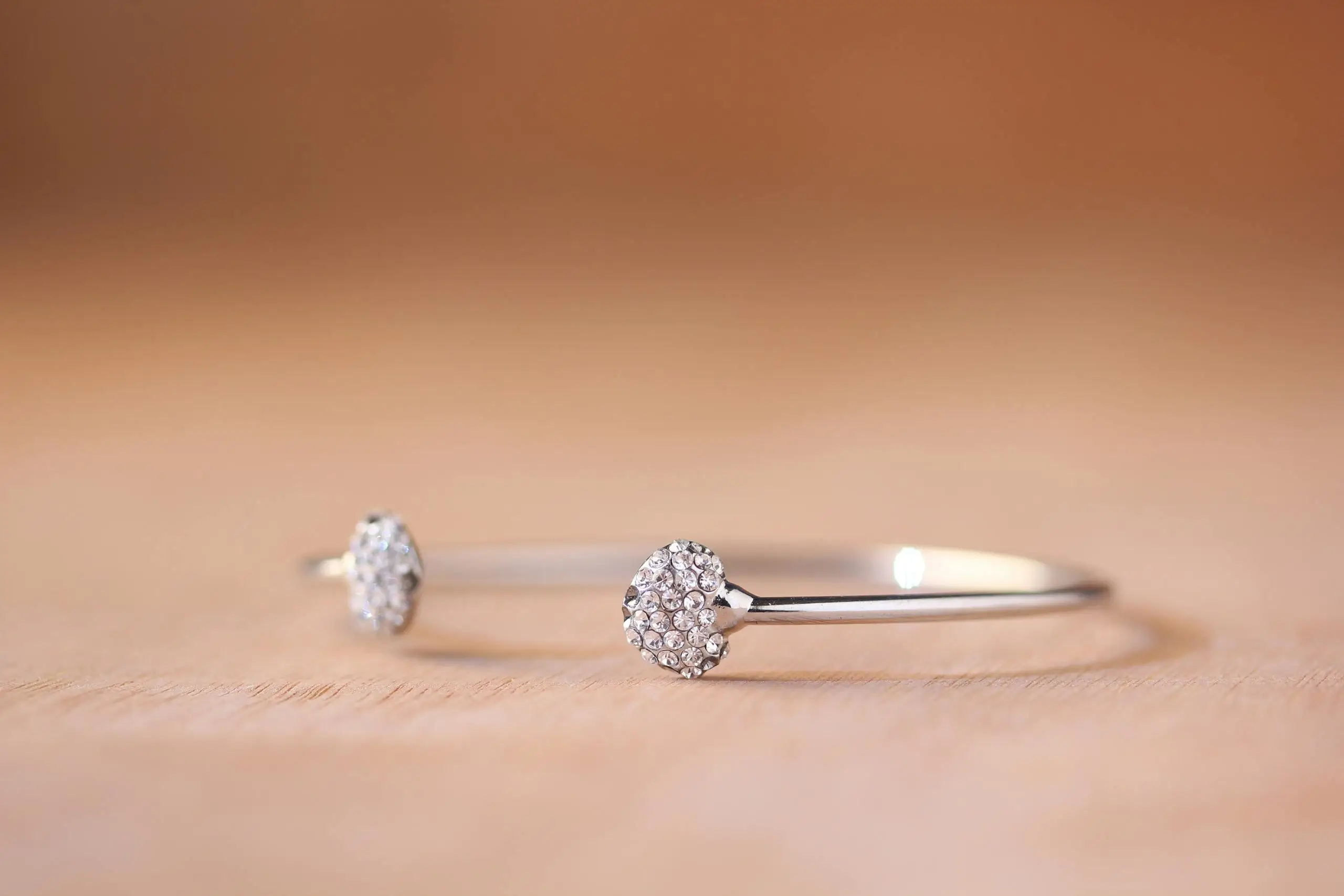 Close-up of an elegant diamond bracelet showing intricate design and natural inclusions