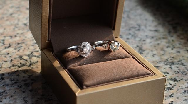 Custom diamond rings in a jewelry box, crafted by Peonyjewels for a unique customer design.