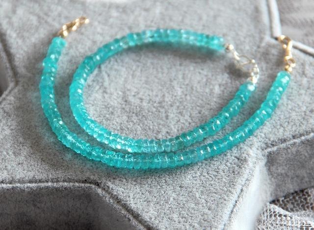 Phosphosiderite bead bracelet featuring Paraiba-like blue-green hues; beautiful yet soft with a Mohs hardness of 5, making it a delicate, short-lived jewelry piece.