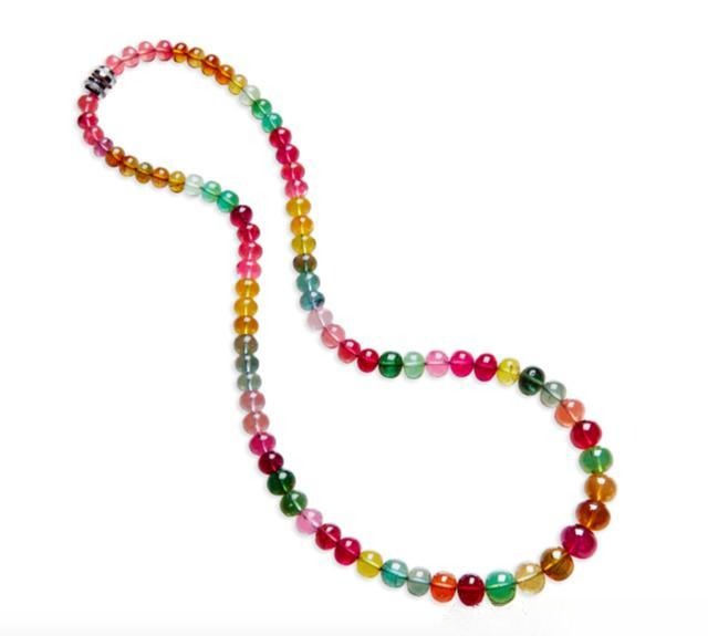 Rainbow-colored tourmaline bead necklace displaying vibrant hues like a natural spectrum.