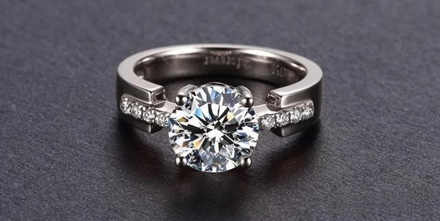 A ring featuring a round prong setting design, showcasing the diamond held securely in place with four round prongs for a classic and elegant look.