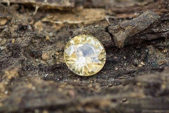 Faceted 3.64-carat yellow sapphire from Sri Lanka after gemstone cutting, showing remarkable brilliance and deep color.
