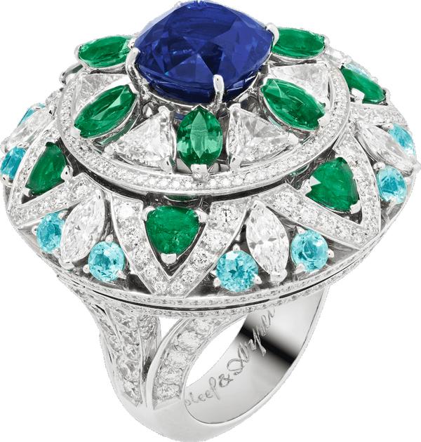 Close-up of a sapphire and diamond ring from Van Cleef & Arpels Le Secret collection, showing its delicate design and hidden  features .