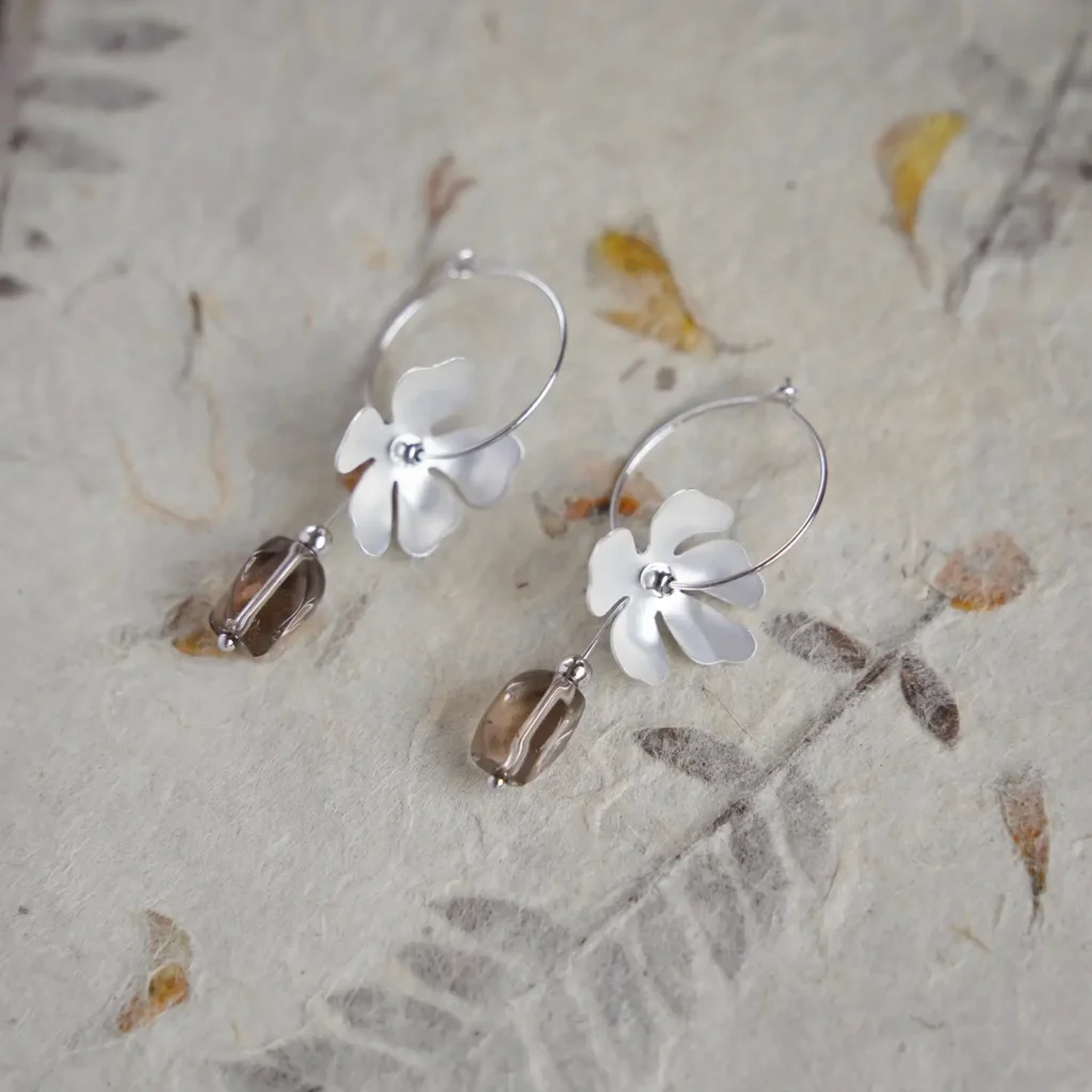 Handcrafted vintage smoky crystal hoop earrings by Peonyjewels, featuring exquisite craftsmanship, warm translucent tones, and elegant design.