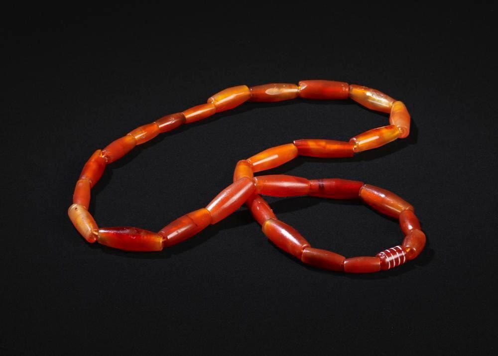 Agate beaded necklace, showcasing vibrant colors and intricate design.